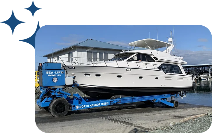 A boat is being loaded onto the trailer.