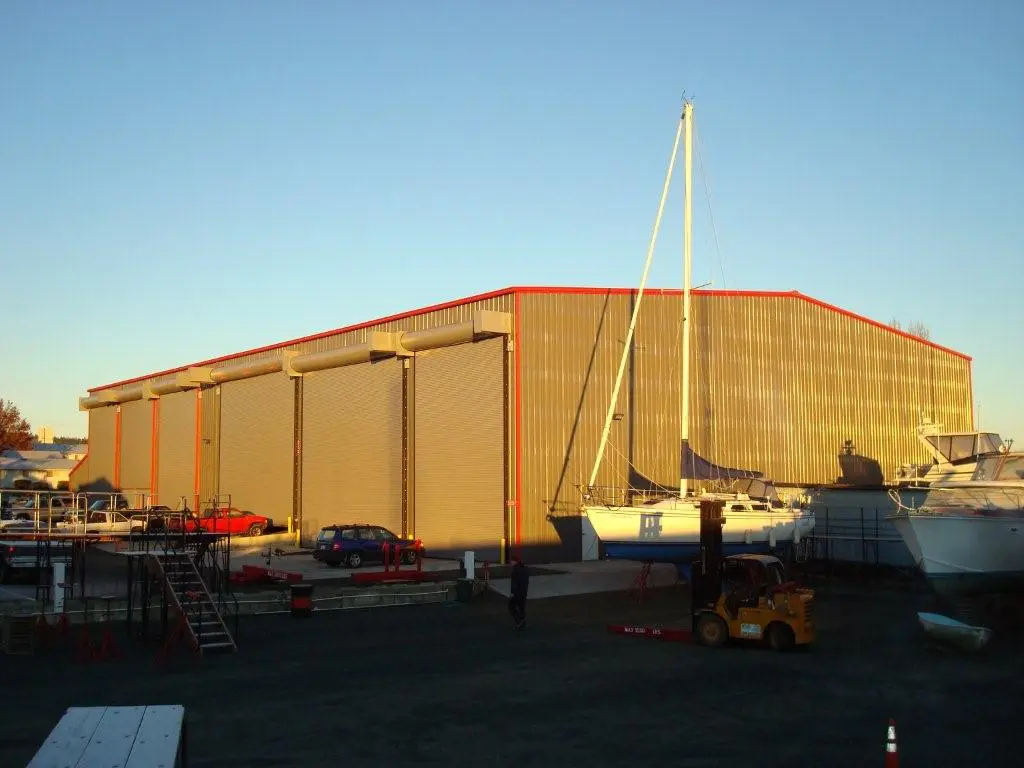 A large building with a boat on it's side.